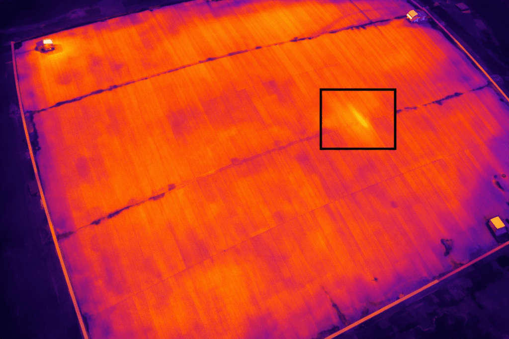 Aerial thermal image of a commercial building roof showing temperature variation for a thermal imaging survey
